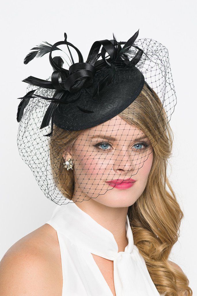 "\"Juliet\" Black Fascinator Headband Be the envy of the party in this elegant felt fascinator. The round felt base is covered with satin ribbon loops, adorned with flighty feathers and topped off with a birdcage veil. This gorgeous piece is perfect for any special occasion. - Easy wear headband - Optional; tuck-a-way veil - Available in several other colors Add Men's Matching Bow Tie: Don't you dare get caught mismatching your sweetie's favorite fascinator! Pippa & Pearl now carries bow tie Black Hat-style Headpieces For Wedding, Black Hat Headpiece For Wedding, Black Hat Style Headpieces For Wedding, Vintage Black Fascinator For Party, Black Evening Fascinator With Short Brim, Black Structured Crown Headpiece For Weddings, Structured Crown Black Headpiece For Wedding, Black Costume Hats With Short Brim For Party, Black Short Brim Party Headpiece