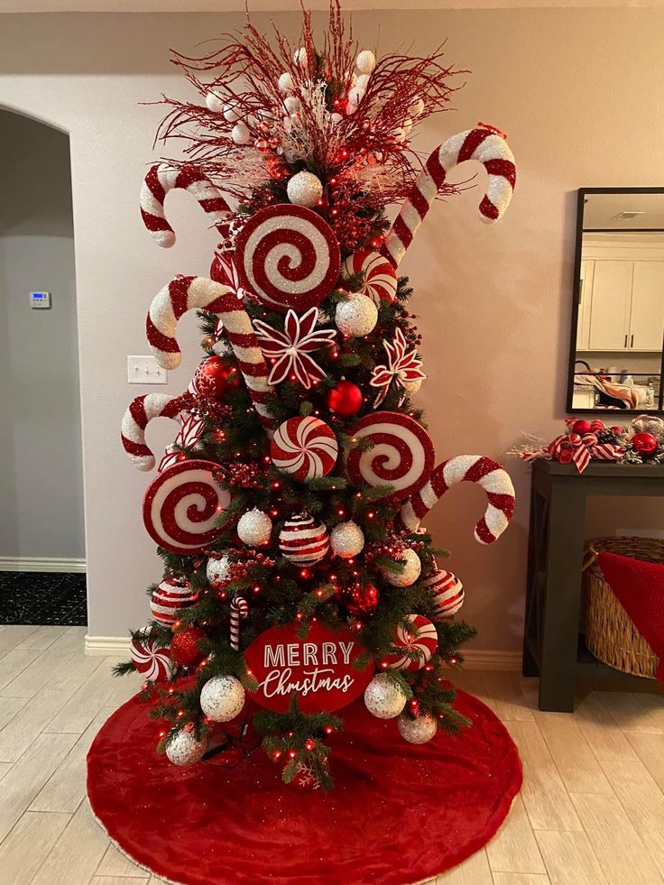 a christmas tree decorated with candy canes and ornaments