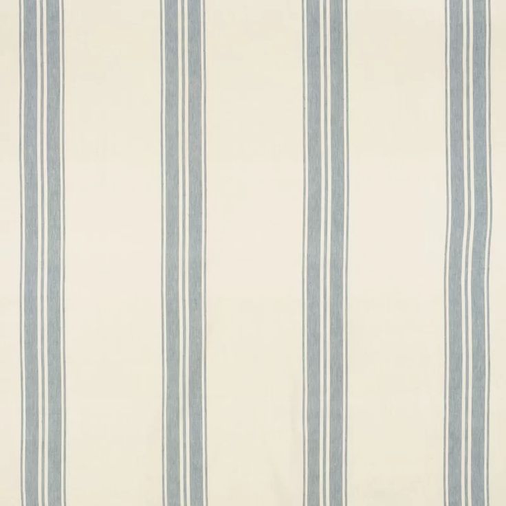 a white and blue striped wallpaper with vertical stripes