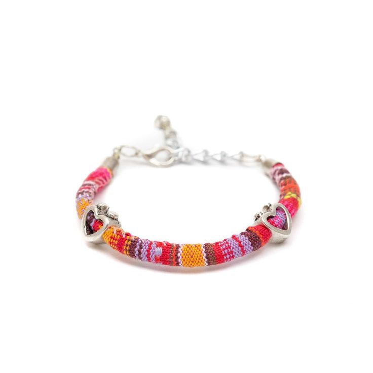 These fun, casual, and gorgeous bracelets are one of our best sellers and are perfect for adding some 'boho flair' to any outfit! Each piece features beautiful and colorful Guatemalan fabric wrapped around a bracelet that is detailed with silver beaded accents. Wear one or stack them - collect them all! As always... Handmade and Fair Trade! 7 1/2" L 100% Cotton Fabric Silver Beads and Clasp Colors/Patterns Will Vary Price is for one random Bohemian Fabric and Bead Bracelet WARNING: CHOKING HAZAR Pink Adjustable Beaded Hippie Bracelet, Hippie Colorful Beaded Summer Bracelets, Multicolor Bohemian Beaded Bracelets, Multicolor Bohemian Beaded Bracelets With Silver Beads, Beaded Wrap Bracelet For Festivals, Hippie Multicolor Beaded Wrap Bracelet, Adjustable Silver Beads Bracelets For Summer, Casual Beaded Wrap Bracelet For Festivals, Bohemian Multicolor Bracelets With Silver Beads