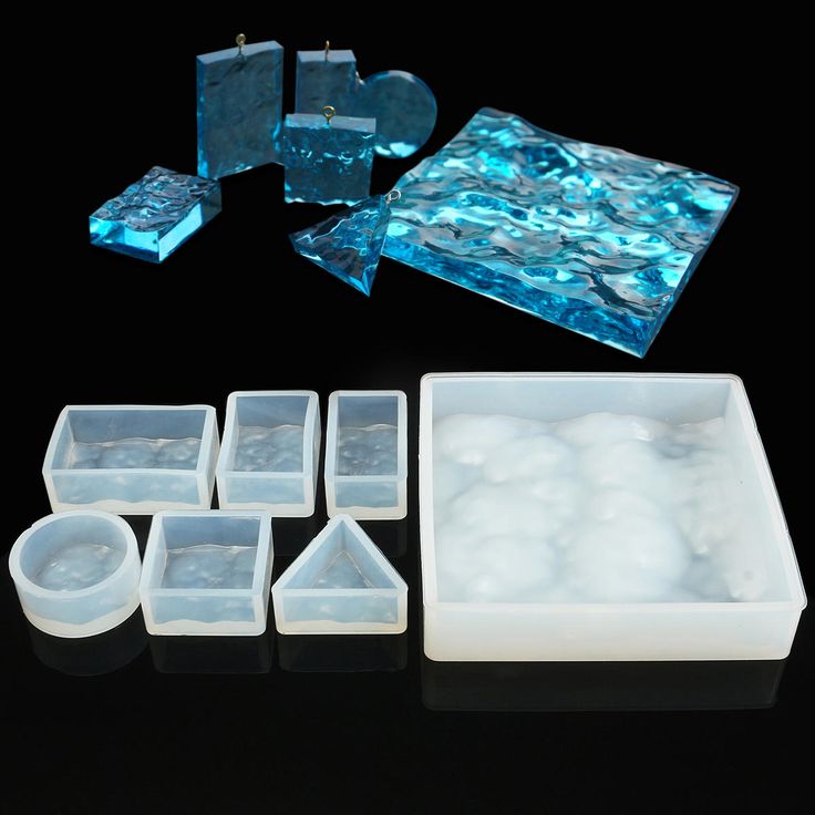 several ice cubes are shown with different shapes and sizes, including one in the middle