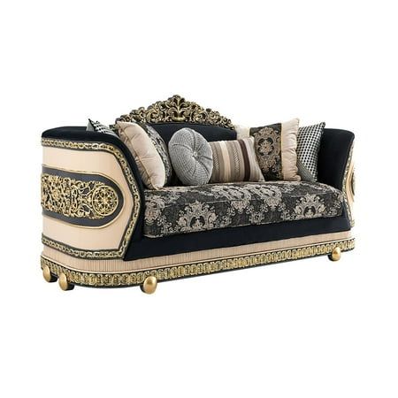 a fancy couch with many pillows on it's back and arm rests against a white background