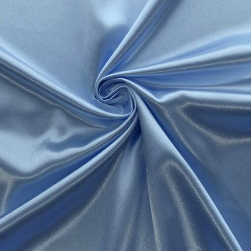 a close up shot of a blue satin fabric