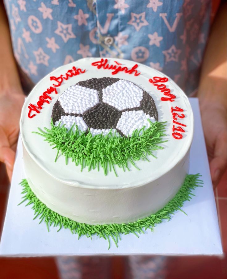 a birthday cake with a soccer ball on it