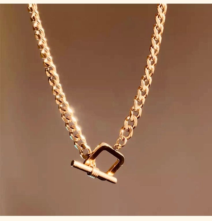 Shop one of our trendiest pieces our 18k gold Plated 3pc set Layering Necklace comes with a square chunky clasp choker chain, Gold Heart chain and a Brown square cubic zirconia stone necklace. Lead and Nickel Free. Elegant Rectangular Metal Chain Necklace, Elegant Metal Chain Necklace With Square Pendant, Elegant Rectangular Clavicle Chain Necklace, Chic Gold Chain Toggle Necklace As Gift, Chic Gold Chain Toggle Necklace Gift, Luxury Chunky Chain Choker Jewelry, Luxury Chunky Chain Choker, Elegant Rectangular Metal Necklaces, Trendy Metal Rectangular Pendant Jewelry