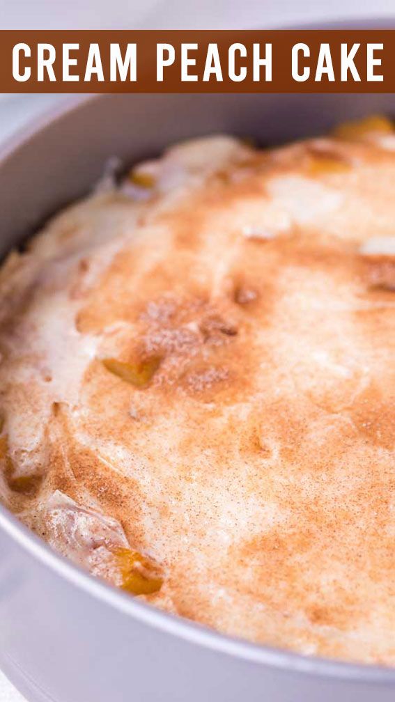 a close up of a cake in a pan with the words cream peach cake on it