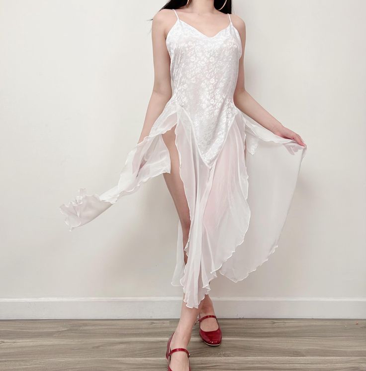 ᥫ᭡ FREE SHIPPING WORLDWIDE ᥫ᭡ SIZING:  Label L MEASUREMENTS- taken with dress lying flat Armpit to armpit: 38" (doubled) Waist: 40"(doubled) Hip: free Length: 48" CONDITION: Excellent Model is 5'6" with a 34C/36B bust. ✿ This piece has been freshly cleaned and is ready to wear. ✿ Please DM your  phone number for international shipping. ✿ Return, exchange, and refund are not accepted, all vintage items are  FINAL SALE. ✿ Happy to help with any questions. Sheer V-neck Summer Nightgown, White Sheer Coquette Dresses, Feminine Sheer Dresses For Loungewear, Feminine Sheer Loungewear Dress, Feminine Sheer Lounge Dress, Sheer Lace Slip Dress For Sleep, Sheer Summer Nightgown For Party, Summer Sheer Nightgown For Party, Sheer Camisole Dress For Beach