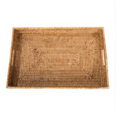 an empty wicker tray on a white background