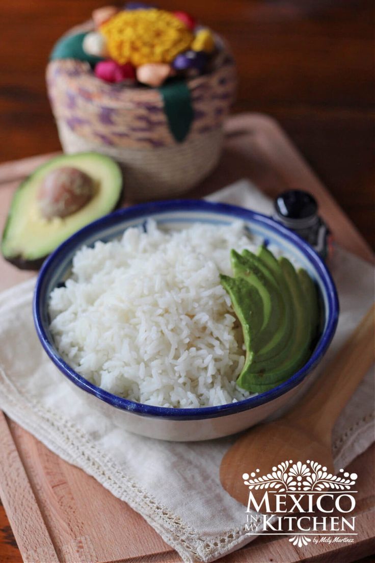 rice and avocado in a bowl on a table