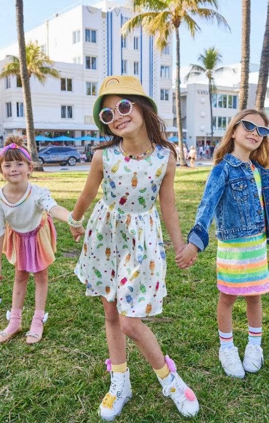 Description: Bright and colorful popsicle and rainbow prints make this sleeveless dress a fun and standout choice for kids. Designed with a round neckline and gathered waist, offering both style and comfort for active days. Ideal for casual outings, summer gatherings, or festive celebrations, making it a versatile addition to your child’s wardrobe. Material & Care: Made from a premium, breathable cotton blend for softness and durability. Machine washable on a gentle cycle; tumble dry low and iro Playful Multicolor Sleeveless Dress For Spring, Playful Multicolor Sleeveless Summer Dress, Casual Multicolor Sleeveless Dress For Day Out, Playful Spring Sundress For Playdate, Playful Sleeveless Dress For Spring Vacation, Cute Sleeveless Beach Dress, Playful Spring Sundress For Playwear, Colorful Playful Sleeveless Dress, Colorful Sleeveless Playful Dress