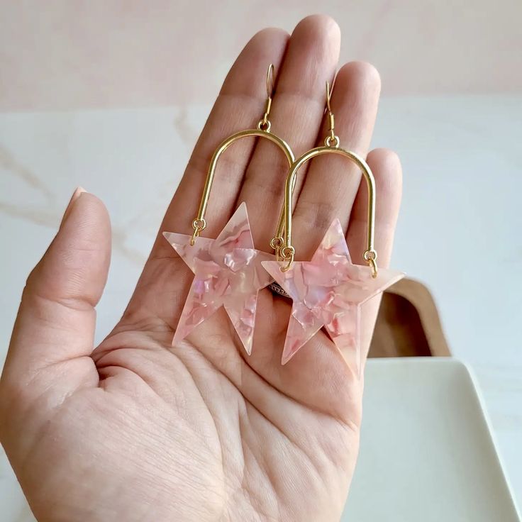 Stunning Pure Favor Earrings 😍 Toggle Clasp Bracelet, Rosie The Riveter, Pop Up Event, Symbolic Jewelry, Elephant Charm, Gold Alloys, Fall Gifts, Star Design, Pink Stars