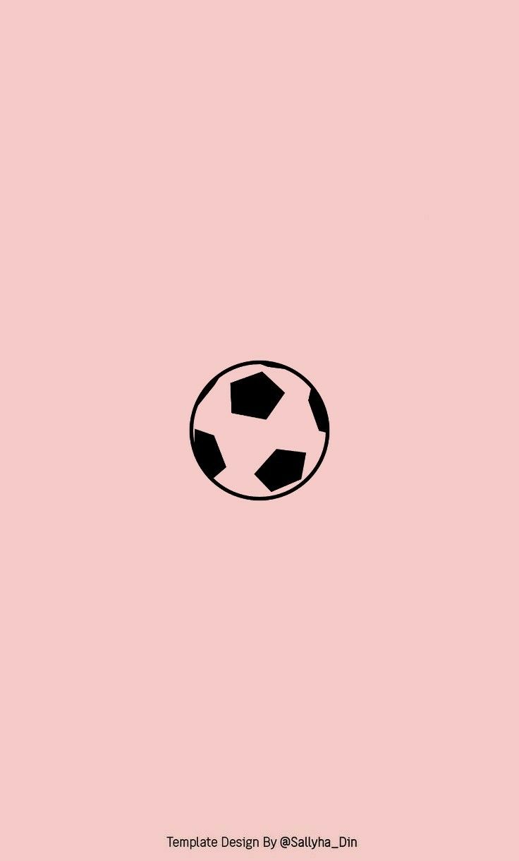 a black and white soccer ball on a pink background