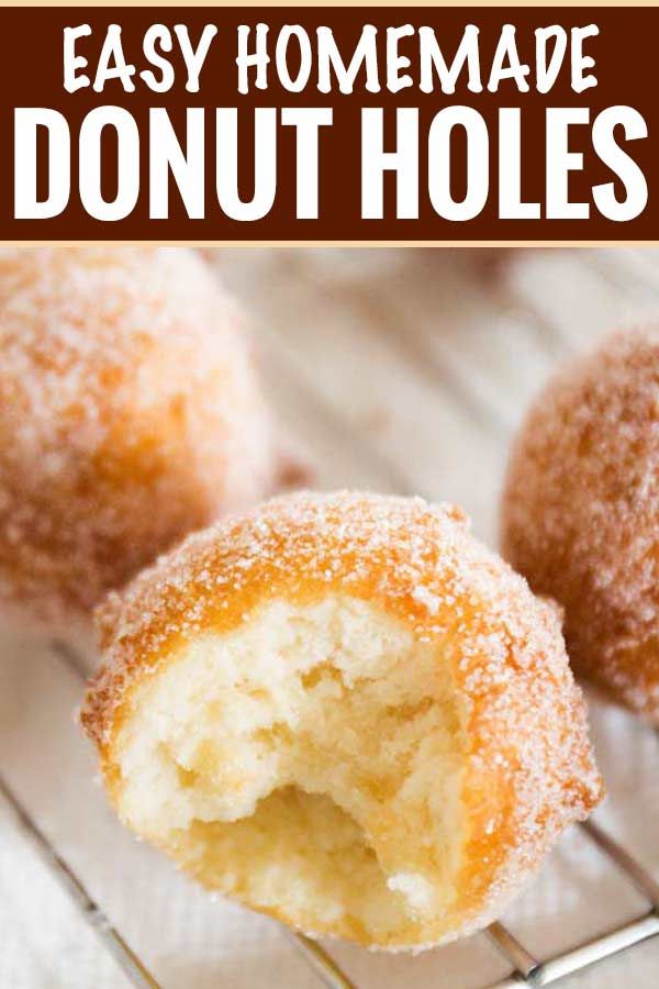 an easy homemade donut holes recipe on a cooling rack