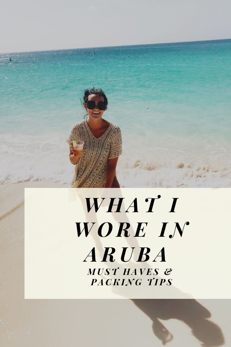 a woman standing on top of a beach next to the ocean with text overlay that reads what i wore in aruba must have and packing tips