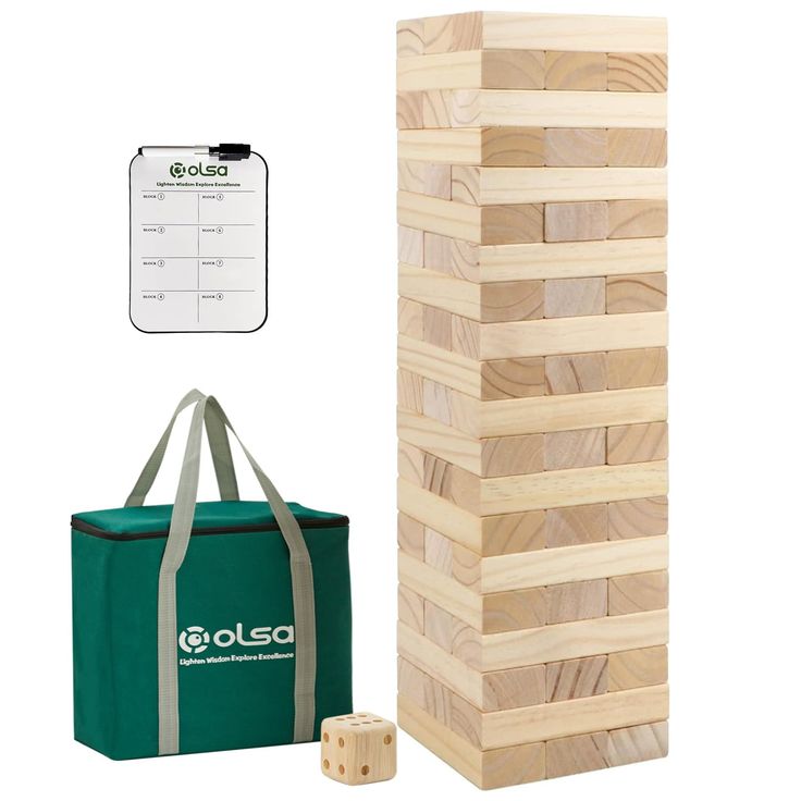 a wooden block tower next to a bag