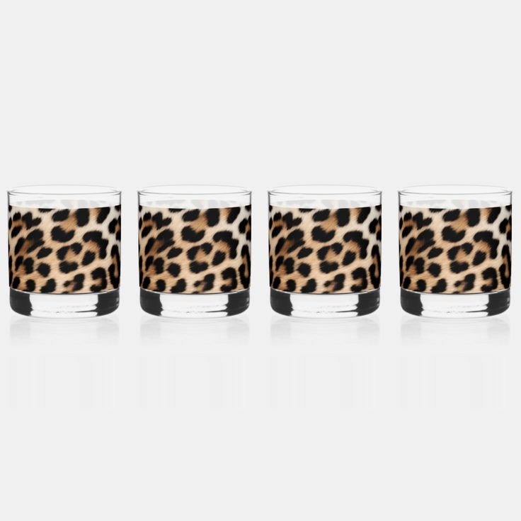 three glasses with leopard print on them