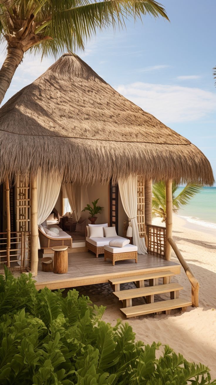 a hut with thatched roof on the beach