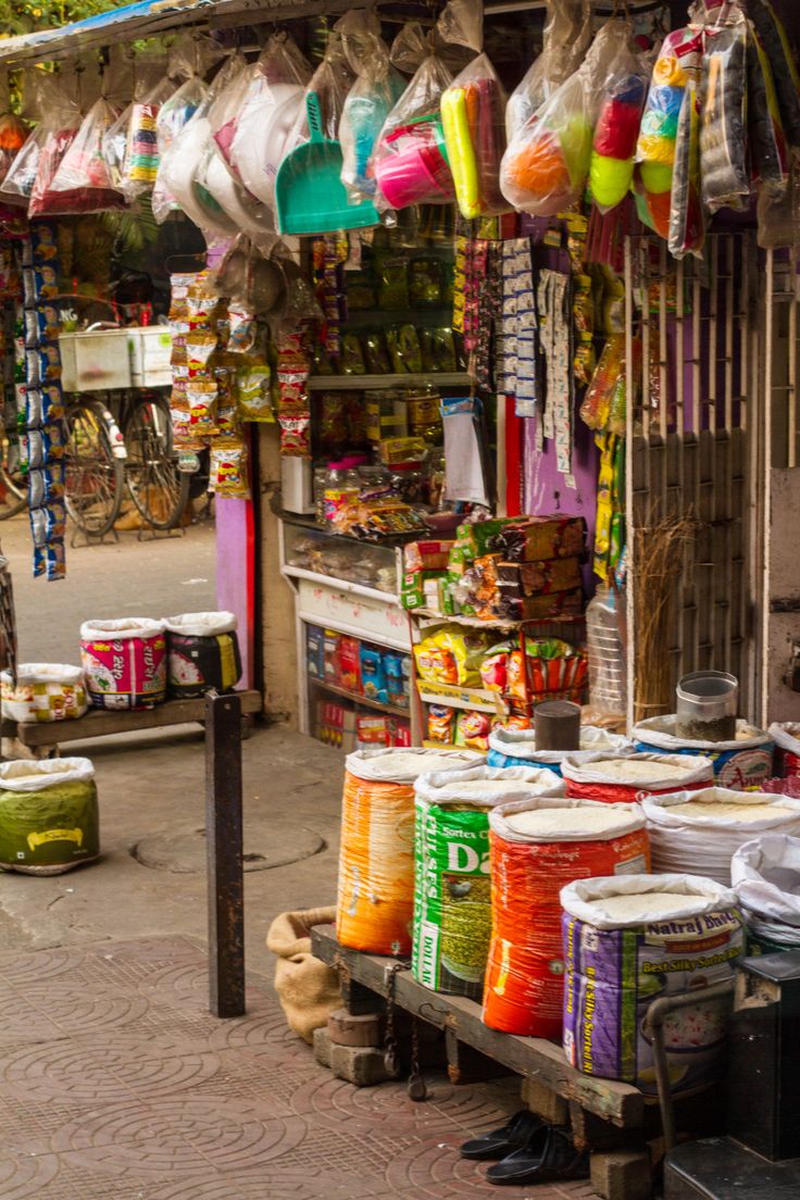 an outdoor market with various items for sale