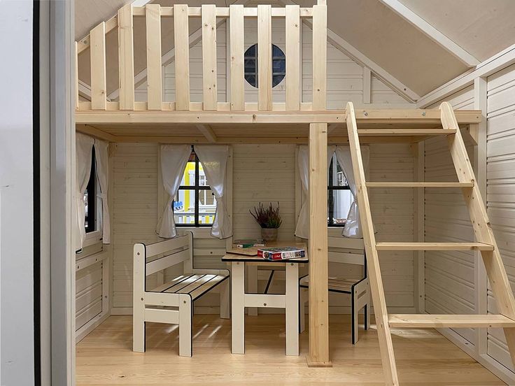 Inside of Kids Playhouse Arctic Auk, Ladder to Loft, Safety Railing, Kids Furniture, Curtains by WholeWoodPlayhouses Playhouse With Loft, Playhouse Interior Ideas, Kids Shed, Luxury Playhouses, Playhouse Interior, Wood Playhouse, Loft Floor, Tree House Diy, Kids Loft