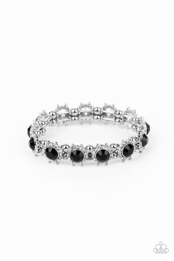 Featuring oversized black rhinestone centers, glittery white rhinestone floral frames join pairs of classic silver beads along stretchy bands around the wrist for a glamorous display.

Sold as one individual bracelet. Floral Frames, Tarnished Jewelry, Shine Bright Like A Diamond, Bracelet Online, Black Bracelets, Paparazzi Accessories, Stretchy Bracelets, White Rhinestone, Affordable Jewelry