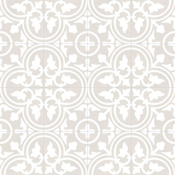 a white and gray tile pattern with circles