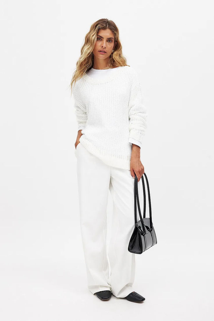 Loose Knitted Sweater White Chic Cropped Crew Neck Sweater, Chic White Crew Neck Cropped Sweater, Chic White Cropped Crew Neck Sweater, Oversized White Chunky Knit Sweater, Soft Knit Off White Sweater, Off White Soft Knit Sweater, White Knit Cropped Sweater For Fall, Chic Winter White Knit Sweater, Chic Cream Chunky Knit Sweater