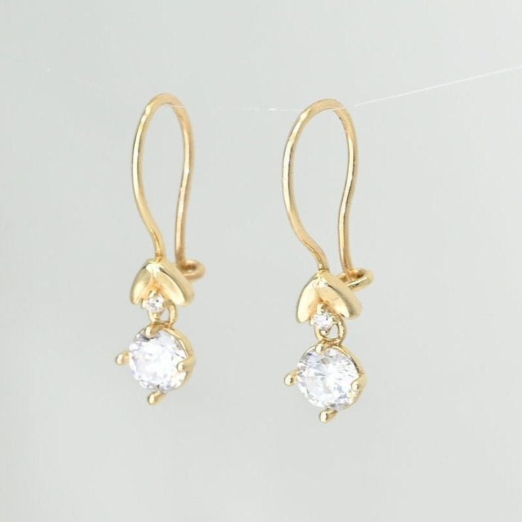 14k Solid Gold Dainty Drop Earrings, Real Gold Premium Earrings For Her. These are special design premium earrings with clip on closure. They're sturdy, manufactured with a special casting technique for your ultimate comfort. You can wear them everyday in every occasion.  💙 Our jewelry is handcrafted with love and great care at San Francisco Bay! All of our items are 14k stamped for authenticity. 💙 You will receive them exactly as pictured. We don't use any filters, all photos are authentic and unedited. 💙 The earring material is 14k solid gold, should not be confused with gold plating or filling. It won't tarnish or fade over time. 💙 We're offering the finest quality in solid gold jewelry. 💙 Quick shipping - Your order will be handcrafted and shipped in a few days. 🎁 They are delive Alexandrite Jewelry, Earrings Real, Handmade Fine Jewelry, Ruby Jewelry, Solid Gold Jewelry, Emerald Jewelry, Sapphire Jewelry, San Francisco Bay, Special Design