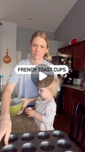 a woman holding a child in front of a muffin pan with the words french toast cups on it