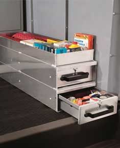 an open drawer on the side of a bed