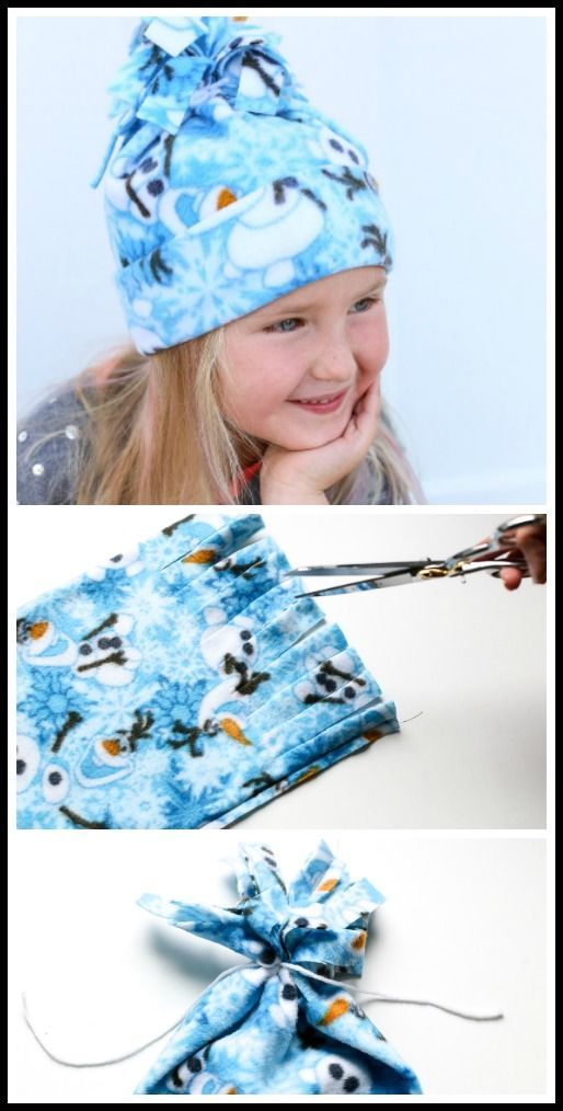 the child is wearing a blue hat and has scissors in it