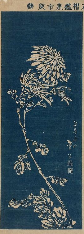 an image of a flower on a blue background with chinese writing in the bottom right corner