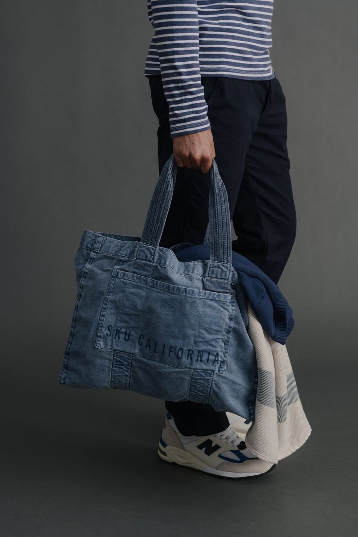 Fit for the beach and beyond, this all-utility California Beach Tote is stylish and durable. Crafted from 14oz 100% cotton canvas, this multi-purpose tote featured an exterior pocket and canvas webb handles in sun-faded inspired colors.Reimagined from a utility tote in our dead stock, we flipped the bag inside out to highlight the clean seam constructions made with skilled workmanship. Whether you're packing for the beach or a weekend getaway, the California Beach Tote has got you covered. - 100 Casual Canvas Beach Bag For Daily Use, Travel Cotton Tote Beach Bag, Casual Summer Canvas Bag With Pockets, Casual Cotton Beach Bag For Travel, Functional Cotton Tote Canvas Bag, Casual Large Canvas Beach Bag, Large Capacity Cotton Beach Bag For Travel, Functional Cotton Canvas Tote Bag, Cotton Beach Bag With Canvas Lining For Travel