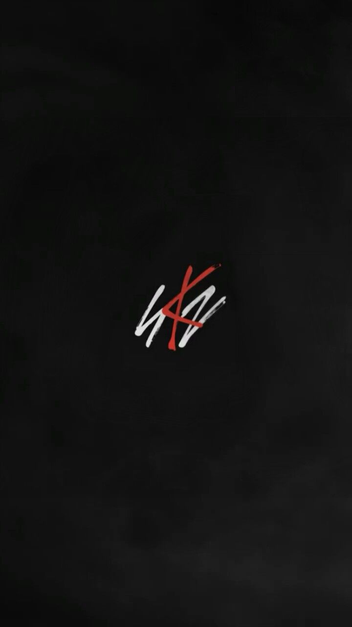 the letters k and h are written in white on a black background with red accents