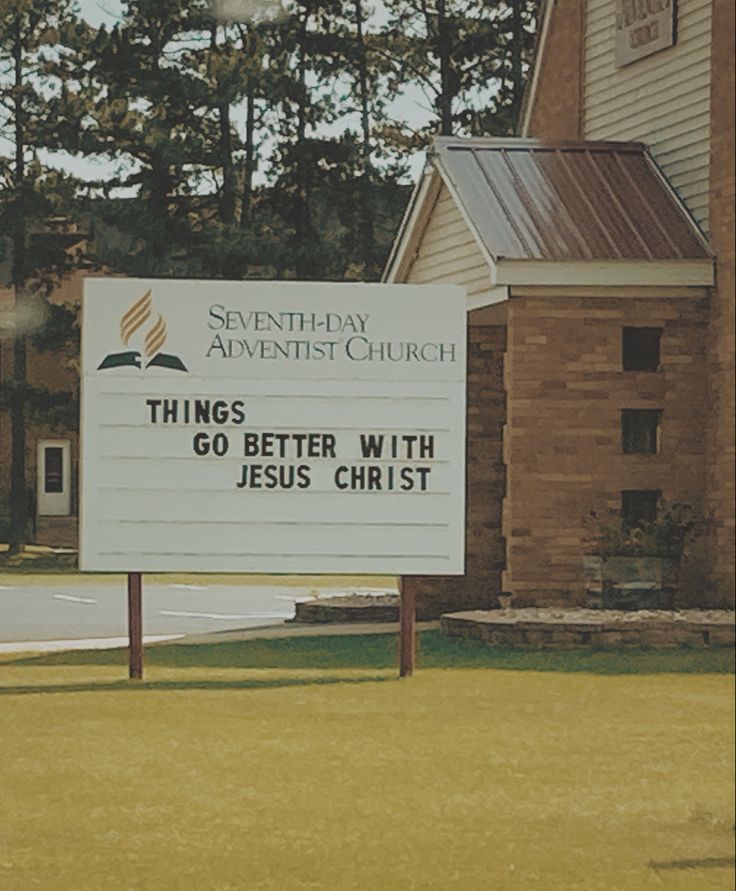 a sign in front of a church that says things better with jesus christ