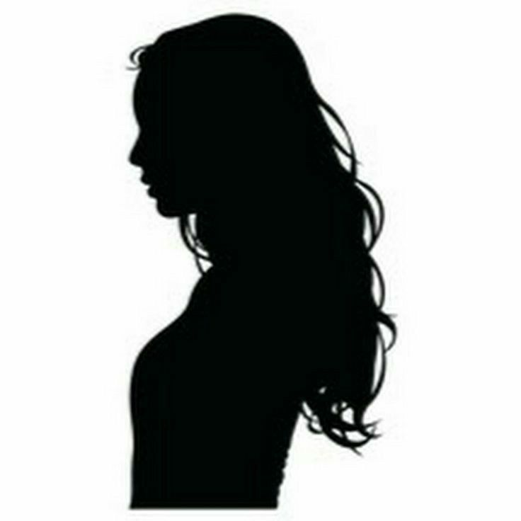 the silhouette of a woman with long hair