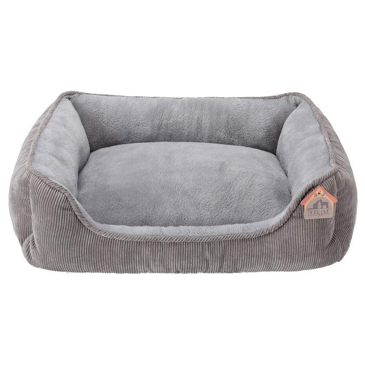 a grey dog bed with a house on the front and bottom, it is made from cord