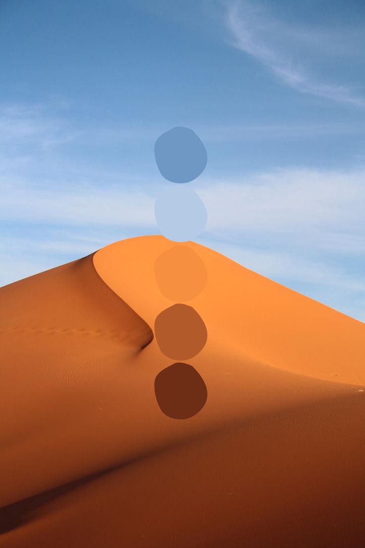 three circles are shown in the middle of a desert