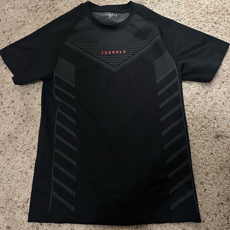 Brand New With Out Tags. Black Fitted Sporty Shirt, Sporty Fitted Black Shirt, Black Athleisure Shirt For Sports, Black Crew Neck Shirt For Sports, Black Graphic Print Top For Workout, Black Graphic Print Athleisure Top, Black Crew Neck Workout Shirt, Black Athleisure Tops With Graphic Print, Sporty Black Shirt For Sports