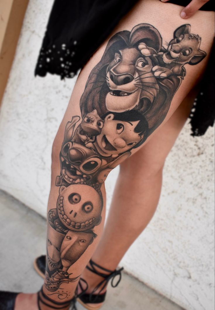 a woman's leg with tattoos on it and an image of the character from beauty and the beast