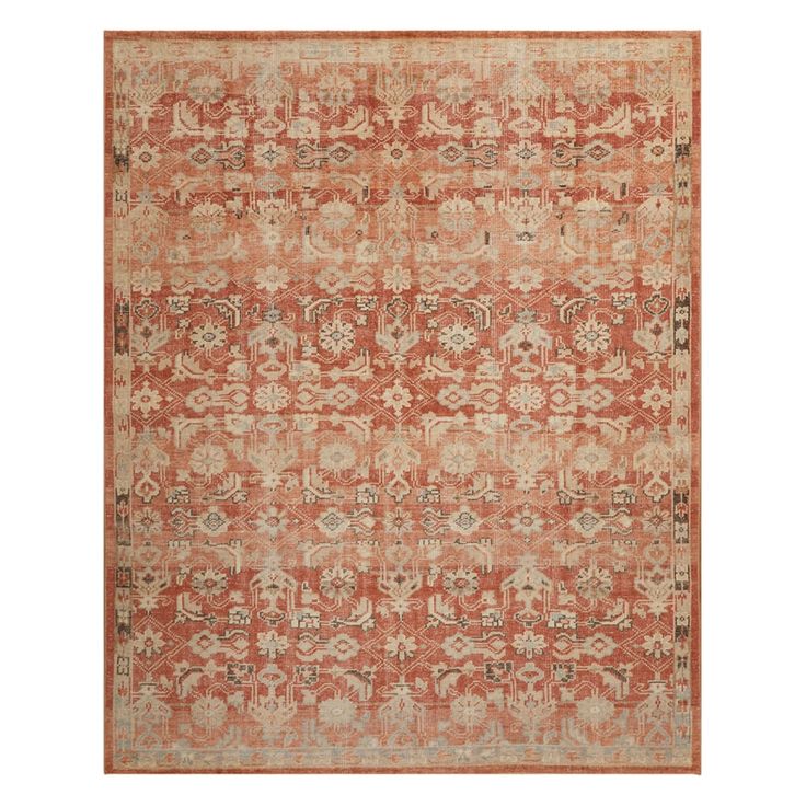 an orange and beige rug with many different designs