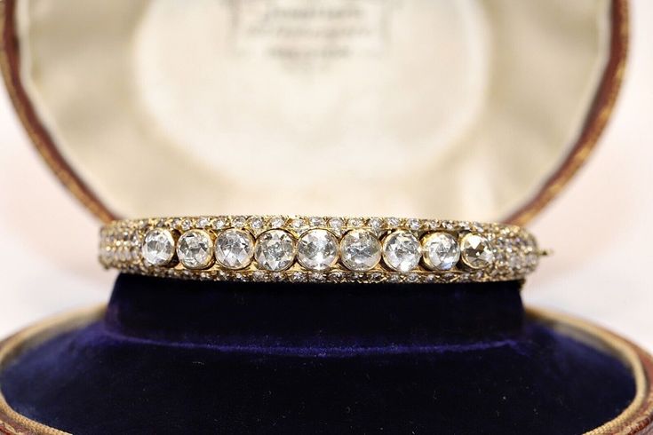 VINTAGE ORIGINAL14K GOLD NATURAL BRILLIANT CUT DIAMOND AND ROSE CUT DIAMOND DECORATED BRACELET In very good condition. Total weight is 33.6 grams. Totally is brilliant cut diamond about 4 carat. Totally is rose cut diamond about  5 carat. The diamond is has  F-G-H color and vs-vvs-s1 clarity. Acid tested to be 14k real gold. Please contact for any questions. Vintage Diamond Bracelet With Brilliant Cut For Formal Occasions, Vintage Brilliant Cut Diamond Bracelet For Wedding, Vintage Diamond Bracelet With Single Cut Diamonds For Anniversary, Vintage Anniversary Diamond Bracelet With Single Cut Diamonds, Vintage Round Brilliant Cut Diamond Bracelet, Vintage Formal Diamond Bracelet With Hand Set, Vintage Diamond Bracelet With Single Cut Diamonds For Wedding, Vintage Diamond Bracelet With Hand Set For Formal Occasions, Vintage Rose Cut Diamond Bracelet Gift