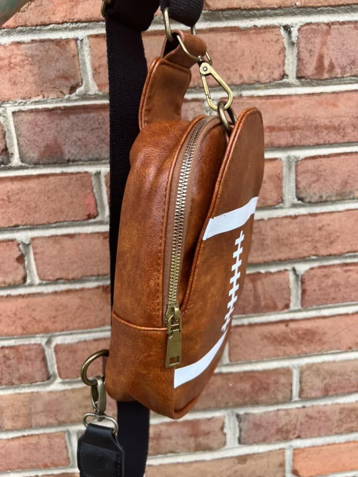 Support your favorite sport in this cute crossbody bag! Strap 46 inches Bag: 10” x 7” x 2.5” Cute Crossbody Bags, Crossbody Bag, Sports