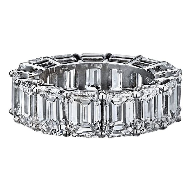 15.53 Carat Emerald Cut GIA Certified Diamond Eternity Ring. GIA certified Emerald-cut diamond eternity band ring, showcasing fifteen colorless diamonds weighing 15.53 total carats, mounted in a shared prong platinum setting. The diamonds are each slightly over one carat with D-E-F color and VVS2-VS2 clarity. Each diamond has it's own certificate. Width: 7mm Size 7. GIA certificates included. Gold Trinity Ring, Emerald Cut Diamond Eternity Band, Forever Diamonds Ny, Emerald Cut Eternity Band, Pink Diamond Engagement Ring, Emerald Wedding Band, Emerald Cut Diamond Ring, Diamond Eternity Ring, Diamond Eternity Band