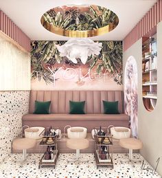 the interior of a restaurant with pink and green decor