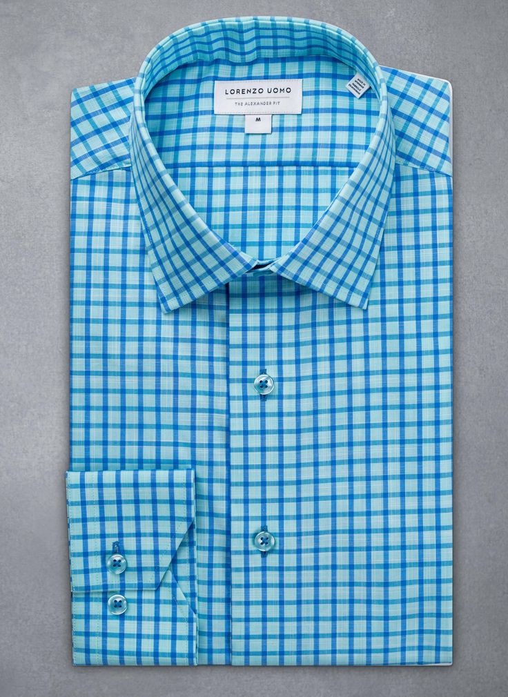 The dreamy feel of the super soft Alexander in Aqua Blue Plaid Shirt evokes the relaxed Mediterranean lifestyle, with its shimmering shades of Blue. Deliberately detailed with well-thought-out accoutrements such as matching blue buttons and button threads lend a custom look to this beautiful shirt. Can be dressed up under a blazer or worn untucked, for a more casual, after-hours look. The Alexander is the trimmest of all our fits, calibrated to accentuate a lean, athletic body type. • Trimmest F Athletic Body Type, Mediterranean Lifestyle, Blue Plaid Shirt, Blue Plaid, Neck Shirt, Plaid Shirt, Aqua Blue, Shades Of Blue, Workout Shirts