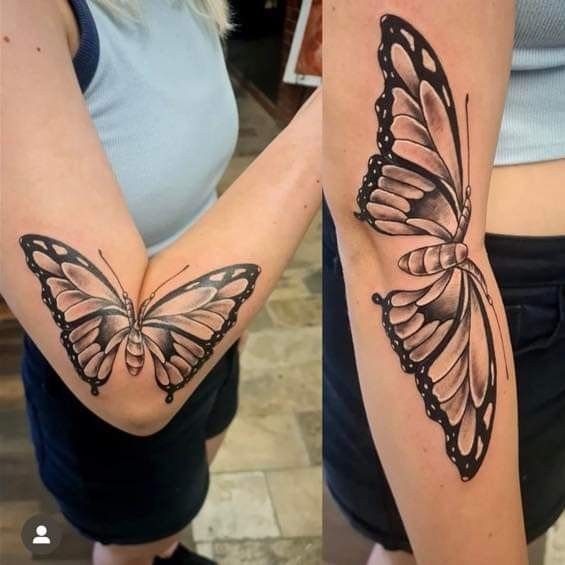 two women with tattoos on their arms and one has a butterfly tattoo on her arm