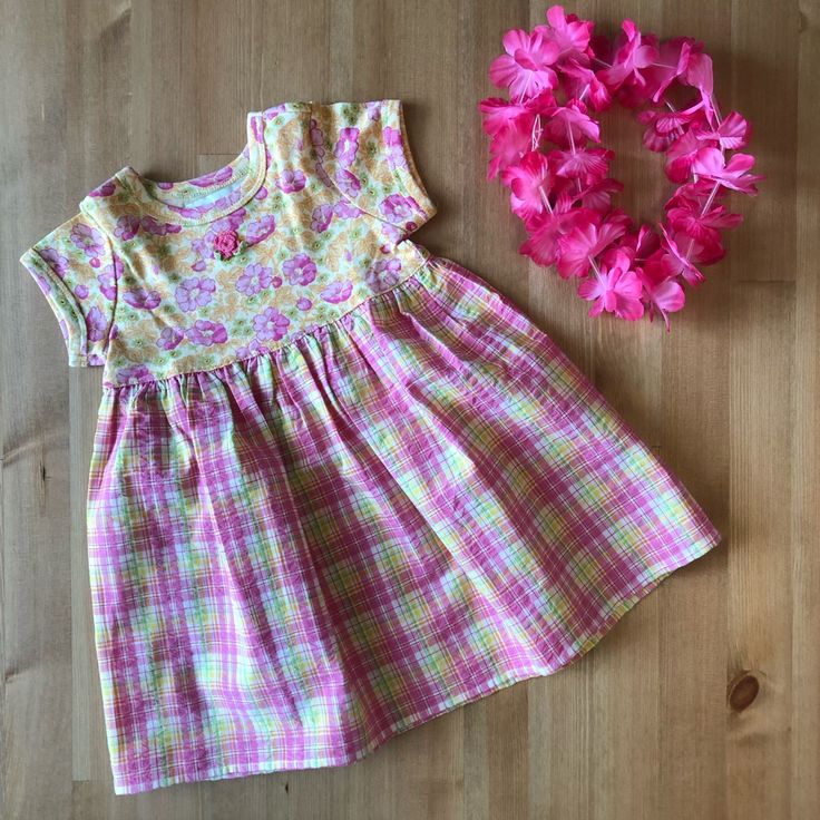 Nwot Baby Lulu Southern Rose Dress. Jersey Knit Yellow Cotton Top With Pink Flowers, Pink Crochet Flower In The Middle Of The Chest. Woven Cotton Plaid Skirt. 100% Cotton, Made In The Usa. Please Send Reasonable Offers, And Feel Free To Ask Questions! Playful Yellow Short Sleeve Dress, Yellow Short Sleeve Dress For Dress-up, Yellow Beach Dresses For Babies, Baby Lulu, Pink Crochet, Flowers Pink, Lulu Dresses, Plaid Skirt, Rose Dress