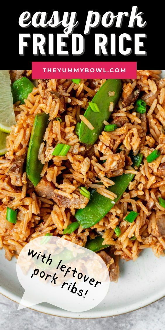 an easy pork fried rice with lettuce and limes on a white plate