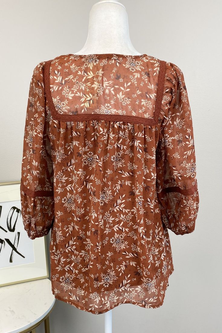 The Expressing Happiness Top By Doe & Rae is a beautiful floral printed blouse. It features a split neckline with tie closure, 3/4 cinched sleeves and pinched pleating on bust for a flattering silhouette. Fabric: 100% Polyester Measurements:Bust: Size M- 20'' Length: Size M- 26'' True To Size S 0-6 M 6-10 L 10-14 Denim Jacket Short, Denim Joggers, Boot Cut Denim, Tall Girl, Graphic Tops, Cardigan Tops, Wide Leg Denim, Blue Shorts, Short Girls