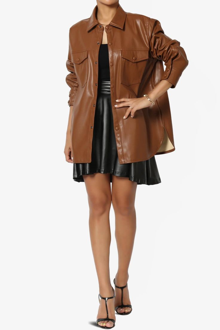 Layer up in the coated finish faux leather shirt. This outer layer can be worn open or buttoned up for extra warmth. Reaching mid-thigh and with long sleeves, you'll be effortlessly stylish every time. Wear with a crop top and denim pants, or leather bottom.Casually-cool vibe of a shirt jacket designed with an easy-to-layer snap buttoned frontPoint collar, Flap chest pockets, Curved hemLong sleeves with button cuffs, Oversized fitFits true to US size, S=Size(4-6), M=Size(8-10), L=Size(12-14), XL Collared Shacket For Everyday, Trendy Solid Color Shacket For Fall, Chic Relaxed Fit Outerwear With Button Closure, Trendy Snap Button Shacket, Collared Solid Shacket For Work, Chic Relaxed Fit Shacket For Workwear, Relaxed Fit Outerwear For Work, Solid Shacket With Button Closure For Work, Trendy Shacket For Spring